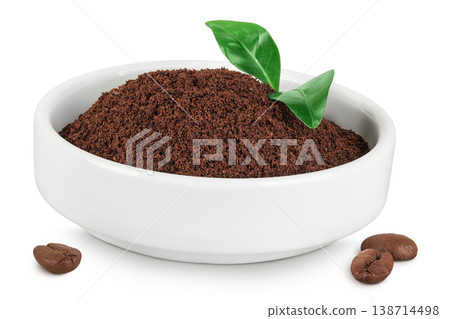 ground coffee in ceramic bowl and coffee beans isolated on white background 138714498