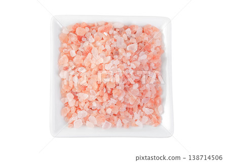 Pink Himalayan salt in ceramic bowl isolated on white background. Top view. Pink Himalayan salt in ceramic bowl isolated on white background. Top view. 138714506