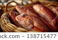 Fish in a woven basket at market 138715477