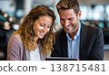 Couple shares tablet in store 138715481