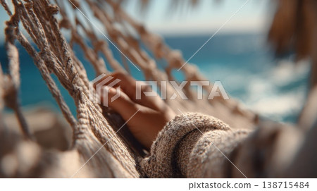 Lady lounges on a hammock Lady lounges on a hammock 138715484
