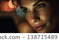 Woman looking at lights in the dark 138715489