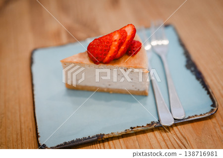Strawberry cheesecake from a stylish cafe 138716981