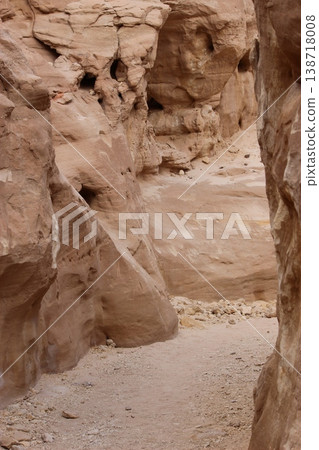A bright rocky mountain bathed in sunlight. A bright rocky mountain bathed in sunlight. 138718008