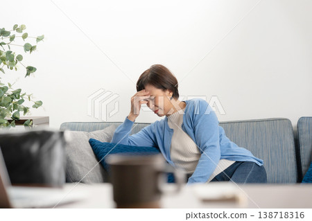 Senior women experience fatigue. 138718316