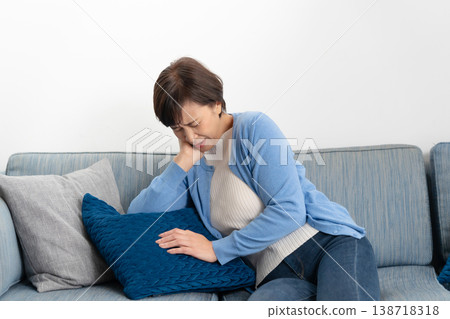 Senior women experience fatigue. 138718318