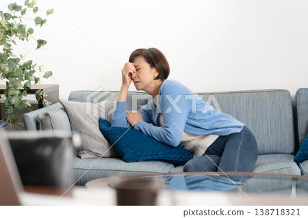 Senior women experience fatigue. 138718321