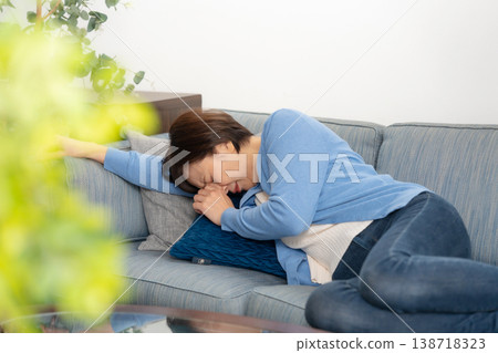 Senior women experience fatigue. 138718323