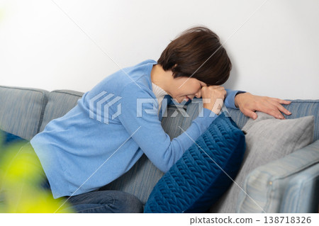 Senior women experience fatigue. 138718326