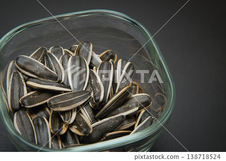 Sunflower seeds are perfect not only for hamsters, but also as a treat for humans. Sunflower seeds are perfect not only for hamsters, but also as a treat for humans. 138718524