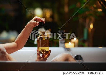Uncorking a Luxurious Bath Product Bottle 138719342