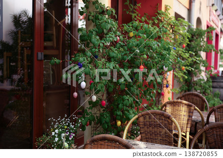 Cozy Outdoor Cafe Terrace with Spring Decoration and Colorful Easter Eggs Cozy Outdoor Cafe Terrace with Spring Decoration and Colorful Easter Eggs 138720855