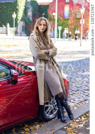 Confident Woman Leaning On Car Urban Autumn Lifestyle Independence Confident Woman Leaning On Car Urban Autumn Lifestyle Independence 138721567