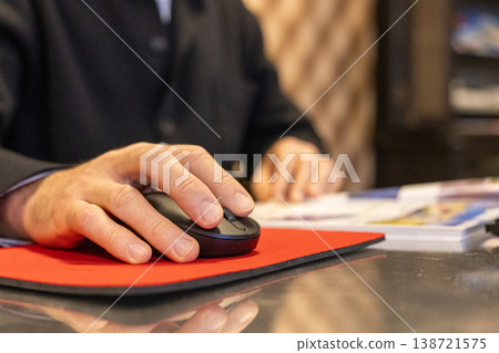 Businessman Hand Using Computer Mouse At Office Desk Closeup Businessman Hand Using Computer Mouse At Office Desk Closeup 138721575
