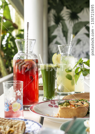 mixed drinks on brunch restaurant table outdoors in singapore garden cafe restaurant mixed drinks on brunch restaurant table outdoors in singapore garden cafe restaurant 138721695
