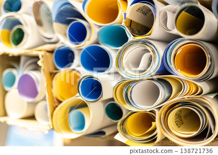 Rolled Poster Paper Stack With Color Print Design Background 138721736