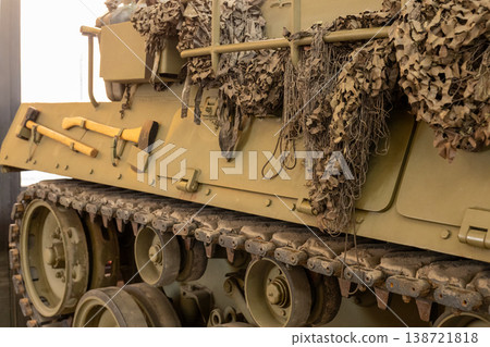 Military Tank Rear Detail With Camouflage Net Axe Tool And Armored Track System Military Tank Rear Detail With Camouflage Net Axe Tool And Armored Track System 138721818