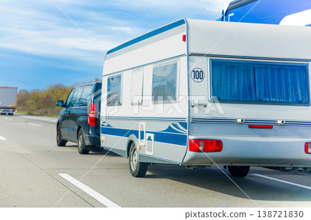 Car Towing Caravan Trailer Driving On Highway Summer Road Trip Travel Vacation 138721830