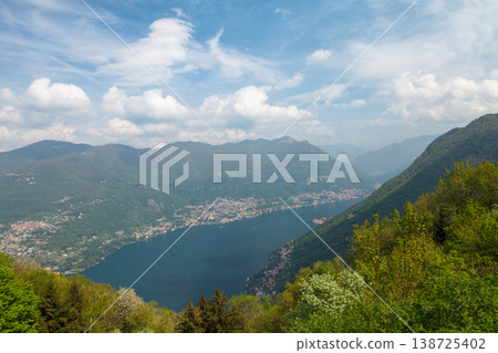 Lake Como shoreline with hillside town panorama Lake Como shoreline with hillside town panorama 138725402