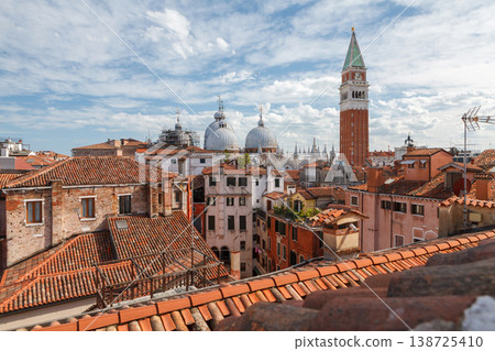 Venice skyline with St Mark bell tower and rooftops Venice skyline with St Mark bell tower and rooftops 138725410