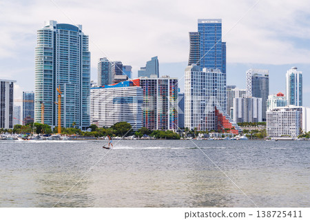 Modern skyline of Miami with towering skyscrapers, tropical vibe, and waterfront views Modern skyline of Miami with towering skyscrapers, tropical vibe, and waterfront views 138725411