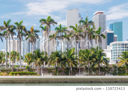 Modern skyline of Miami with towering skyscrapers, tropical vibe, and waterfront views Modern skyline of Miami with towering skyscrapers, tropical vibe, and waterfront views 138725413