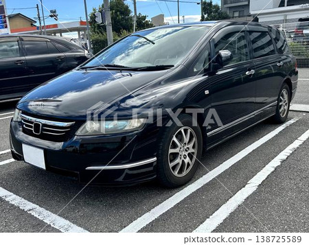 Passenger cars lined up in the parking lot 138725589