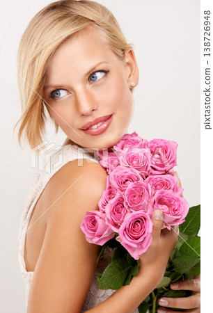 Flowers, bouquet and rose with woman in studio for floral, valentines day and romance gift. Plants, beauty and happy with face of female person on white background for elegant, love and present Flowers, bouquet and rose with woman in studio for floral, valentines day and romance gift. Plants, beauty and happy with face of female person on white background for elegant, love and present 138726948