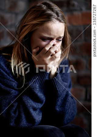 Woman, abuse and crying with hands, scared and alone with fear, hiding and afraid. Toxic relationship, shame or home for physical assault, problem or domestic violence with terror, anxiety or pain Woman, abuse and crying with hands, scared and alone with fear, hiding and afraid. Toxic relationship, shame or home for physical assault, problem or domestic violence with terror, anxiety or pain 138727267