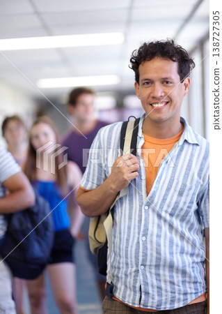 Student, university and backpack in corridor, smile and ready for class, man and happy. Portrait, education and knowledge for learning, study and college for career, campus and youth scholarship 138727305