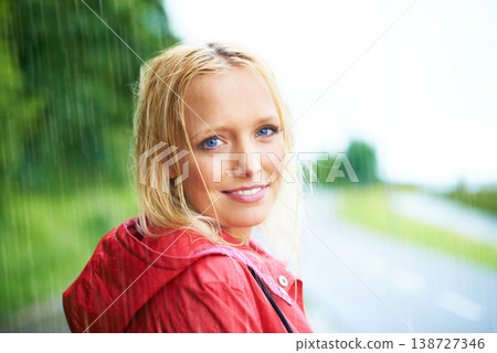Happy, portrait and young woman in the rain with coat in nature, road or street for winter. Smile, positive attitude and female person from Australia in drizzle or storm weather in outdoor forest. Happy, portrait and young woman in the rain with coat in nature, road or street for winter. Smile, positive attitude and female person from Australia in drizzle or storm weather in outdoor forest. 138727346