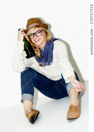 Style, wine and portrait of woman in studio with a trendy, cool and stylish outfit and accessories. Confident, alcohol and female model from Australia with edgy and casual fashion by white background Style, wine and portrait of woman in studio with a trendy, cool and stylish outfit and accessories. Confident, alcohol and female model from Australia with edgy and casual fashion by white background 138727418