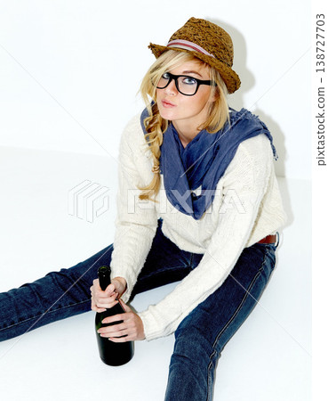 Style, champagne and portrait of woman in studio with trendy, cool and stylish outfit and accessories. Confident, wine and female model from Australia with edgy and casual fashion by white background Style, champagne and portrait of woman in studio with trendy, cool and stylish outfit and accessories. Confident, wine and female model from Australia with edgy and casual fashion by white background 138727703