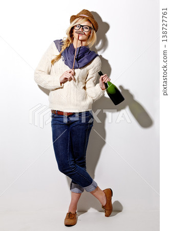 Portrait, woman and holding moustache with champagne for photo or comic on a white background for fun. Funny, alcohol and girl with a prop at an event for crazy, comedy and celebration for a picture 138727761