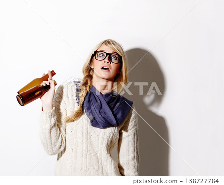 Beer, drink or woman with mockup space for fun celebration, party or hipster event in studio. Thinking, girl or female person drinking alcohol or beverage in bottle looking up on white background Beer, drink or woman with mockup space for fun celebration, party or hipster event in studio. Thinking, girl or female person drinking alcohol or beverage in bottle looking up on white background 138727784
