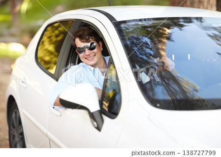 Happy, portrait and a man in a car for travel, drive or a journey on the road. Smile, morning and a person or driver in a vehicle, motor or transport for driving for a trip, traveling or a commute Happy, portrait and a man in a car for travel, drive or a journey on the road. Smile, morning and a person or driver in a vehicle, motor or transport for driving for a trip, traveling or a commute 138727799
