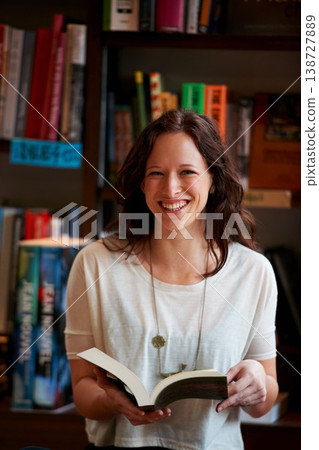 Library, books and portrait of woman in bookstore or shop read for research, learning and relaxing. Literature, customer and happy person with book for education, information and knowledge for hobby Library, books and portrait of woman in bookstore or shop read for research, learning and relaxing. Literature, customer and happy person with book for education, information and knowledge for hobby 138727889
