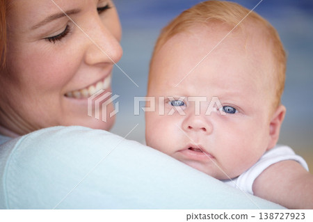Baby, relax and portrait of newborn with mother in home holding infant and bonding together with a smile. Child, happiness and mom carrying boy in arms with love, care and support of mommy in house Baby, relax and portrait of newborn with mother in home holding infant and bonding together with a smile. Child, happiness and mom carrying boy in arms with love, care and support of mommy in house 138727923