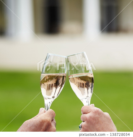 Couple, married and hands with champagne in celebration of anniversary, success or retirement. Mature, man and woman with toast, drink or cheers at hotel for love, romance or quality time in bond 138728034