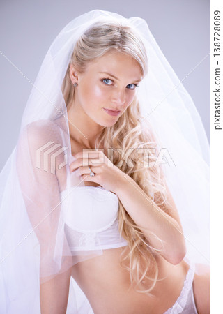 Portrait, bride and woman with lingerie, beauty and confident on a white studio background. Person, model and girl with wedding, honeymoon or underwear with intimacy, luxury and fashion with marriage Portrait, bride and woman with lingerie, beauty and confident on a white studio background. Person, model and girl with wedding, honeymoon or underwear with intimacy, luxury and fashion with marriage 138728089