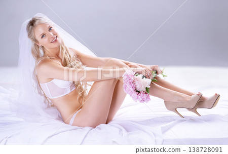 Portrait, woman and bride with bouquet, lingerie and luxury with beauty on a white studio background. Person, happy model and girl with flowers, underwear and veil with heels, excited and marriage Portrait, woman and bride with bouquet, lingerie and luxury with beauty on a white studio background. Person, happy model and girl with flowers, underwear and veil with heels, excited and marriage 138728091