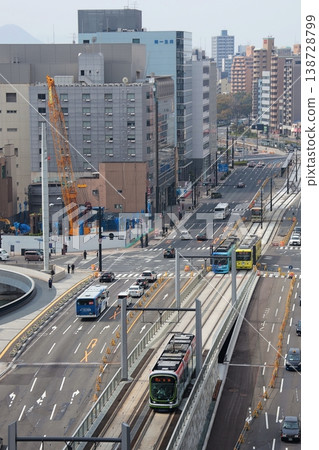 A view of the city in front of Hiroshima Station from the rooftop of the Hiroshima Station building. A view of the city in front of Hiroshima Station from the rooftop of the Hiroshima Station building. 138728799