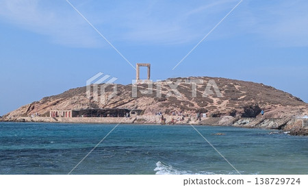 Greek ruins of the Temple of Apollo on a hill on a small island 138729724