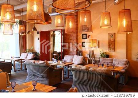 Radiant dining environment with layered materials and inviting warm tones 138729799