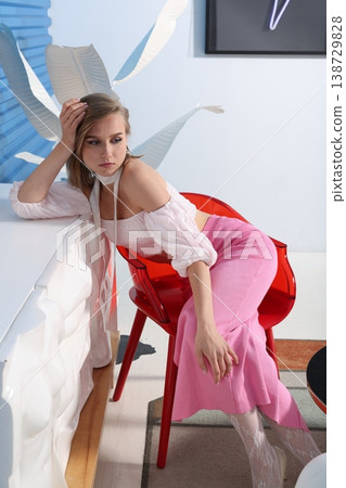 Creative studio atmosphere with modern lighting and decorative elements Creative studio atmosphere with modern lighting and decorative elements 138729828