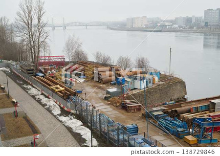 Winter construction scene. Overcast winter day at worksite 138729846