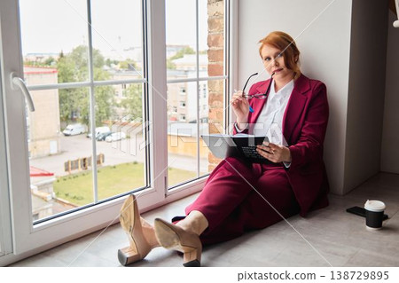 Woman designing brand ideas during relaxed creative session Woman designing brand ideas during relaxed creative session 138729895