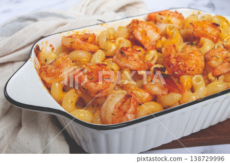 pasta with shrimp and cheese, with a golden crust, cooked in a baking dish, homemade, no people, 138729996