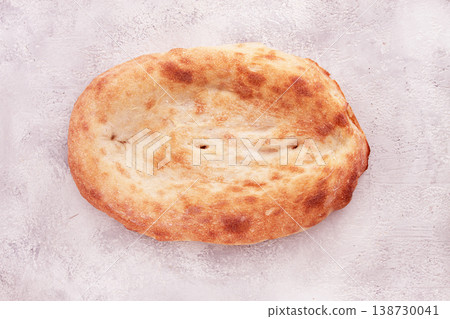 Georgian lavash bread, freshly baked, top view, on the table, no people, Georgian lavash bread, freshly baked, top view, on the table, no people, 138730041