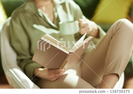 Quiet Moments of Rejuvenation with a Book and Tea Quiet Moments of Rejuvenation with a Book and Tea 138730375